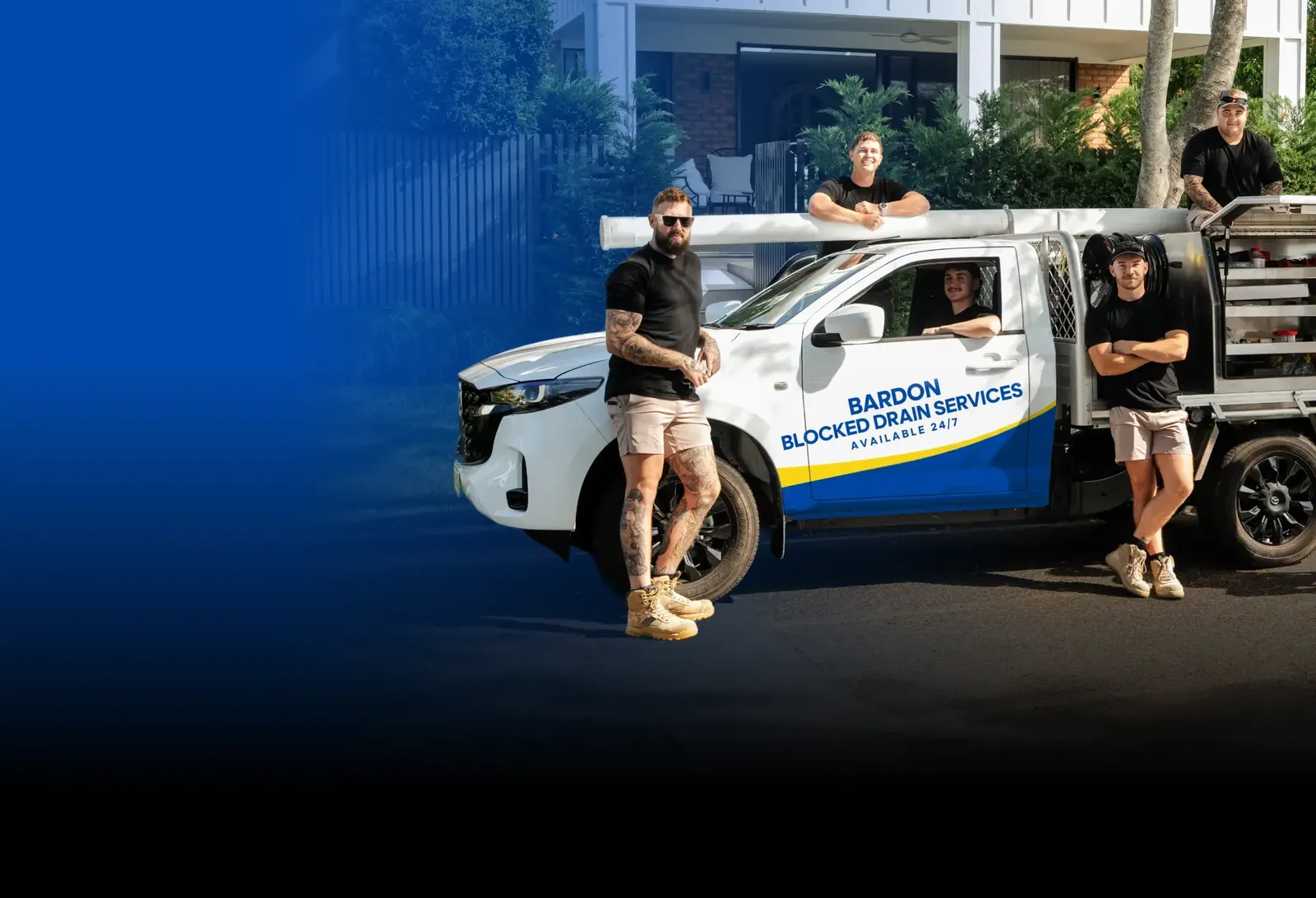 Bardon Blocked Drain Services team with the ute